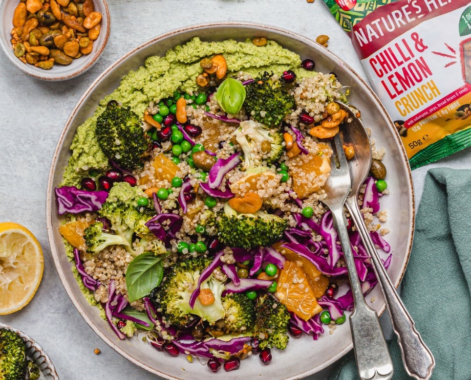 A bowl of roasted broccoli, pea, and quinoa.