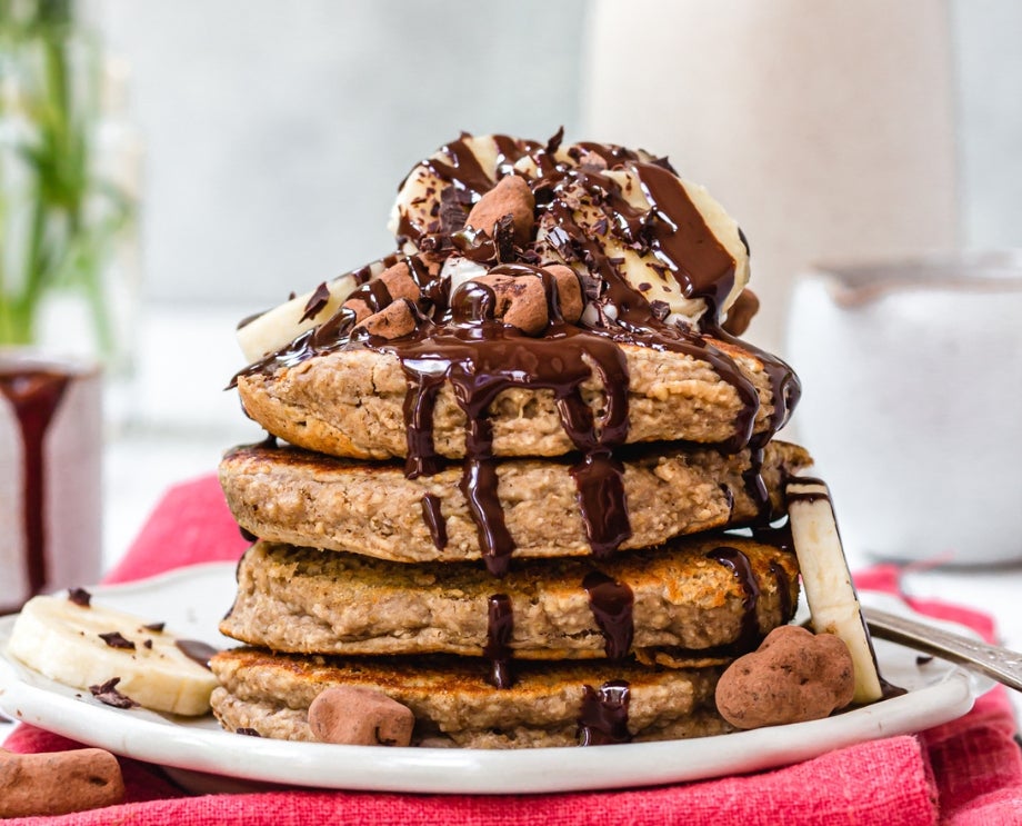 A stack of fluffy vegan chocolate banana pancakes
