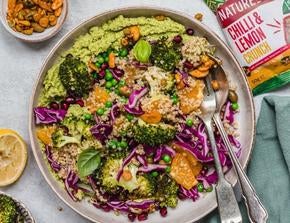 A bowl of roasted broccoli, pea, and quinoa