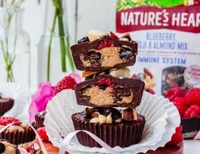 A stack of vegan cookie dough cups by Nature's Heart