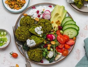 Green Falafel Balls on a plate with Salad