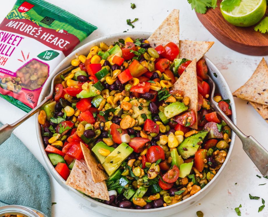 A bowl of salsa with tortilla chips