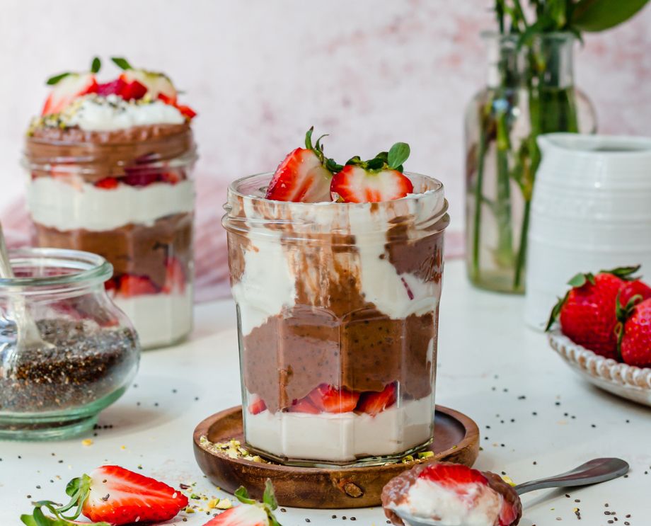 Two jars of chocolate strawberry chia seed pudding