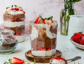 Two jars of chocolate strawberry chia seed pudding