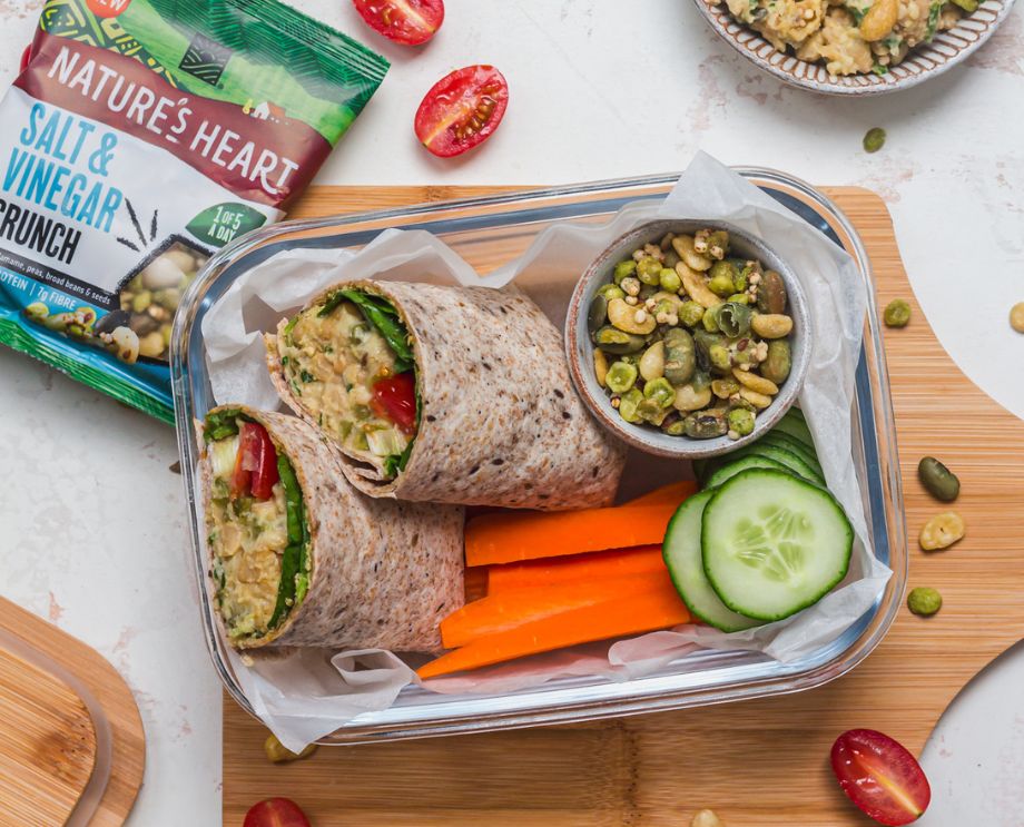 Lunchbox with Chuna Crunch Wraps, carrot sticks, cucumber, and a container of Nature's Heart Crunch